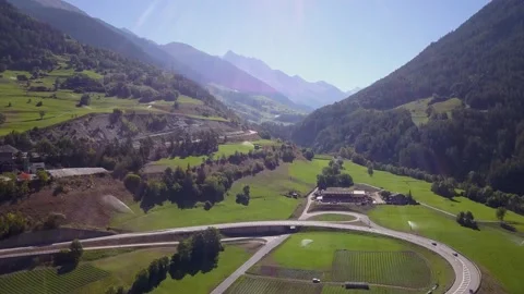 Drone footage of a small town surrounded by mountains in Italy (4K) Stock Footage 189365230