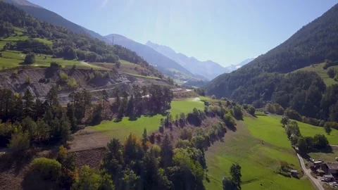 Drone footage of a small town surrounded by mountains in Italy (4K) Stock Footage 189365326