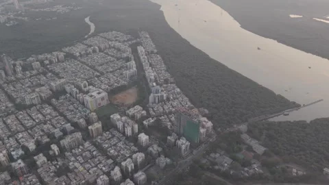 Drone Footage of Sun Setting Over Gorai Creek – Tranquil Mumbai Evening Stock Footage 307771502