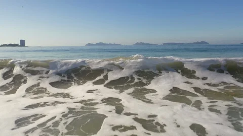 Drone footage super close to small wave in Galicia Coast Video stock 130126502
