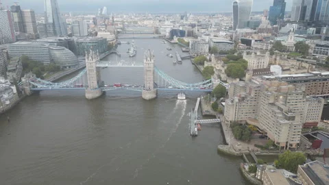 Drone footage of the Thames River with iconic buildings and the Tower Bridge. Stock Footage 295955867