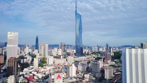 Drone Footage Tilt-Up Reveal of Malaysia's Tallest Skyscraper Merdeka 118 with Stock Footage 314810295