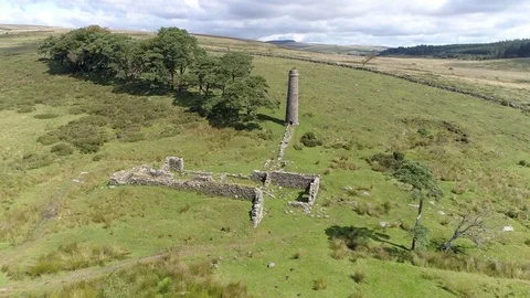 Drone Footage:   Tin Mine, old ruined granite buildings Stock Footage 79501074