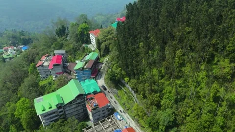 Drone footage of traffic weaving through Gangtok’s green streets. Stock Footage 311370514