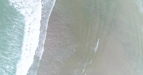 Drone footage of tranquil beach from above Stock Footage 316594635
