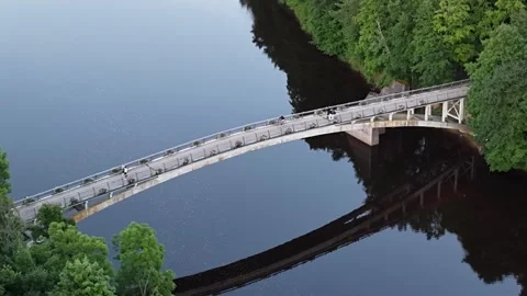 Drone footage of unique bridge while pedestrians crossing, Ogre Latvia Stock Footage 341770137