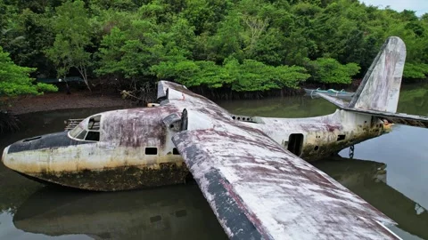 Drone footage of a wreck plane half submerged in Philippines Stock Footage 244472114