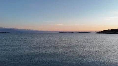 Drone Forward Flight Deep Over Mediterranean Waters at Sunrise Stock Footage 334649694