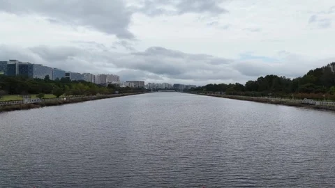 Drone Forward Flight Over Calm River With Cityscape in Seoul, Korea Stock Footage 319660511