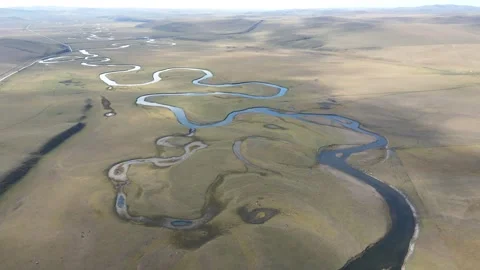 Drone Forward Flight Over Curving River Hulunbuir Grassland Stock Footage 331422707