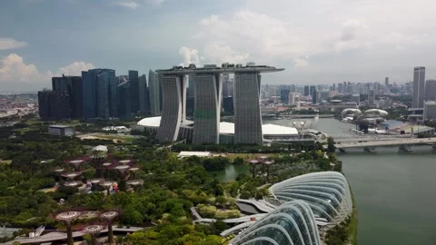Drone Forward Flight Over Gardens by the Bay and Marina Bay Sands, Singapore Stock Footage 315138950