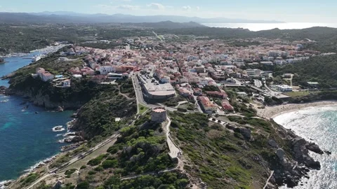 Drone Forward Flight from Rough Sea Toward Santa Teresa Gallura Coastal Vídeo Stock 332457392