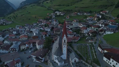 Drone Forward Flight Towards Historic Church And Alpine Village In Austria Stock Footage 340777432