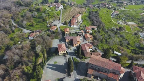Drone Forward Flight Village Montevecchia Rooftops Vineyards Italy 4K Stock Footage 331352672