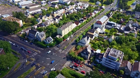 Drone forward flyover above Pontchaillou district intersection in Rennes Stock Footage 339877186