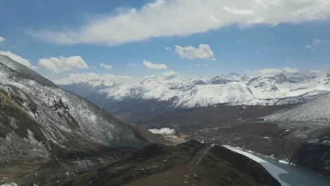 Drone Forward Push Through Kulagangri Snow Mountains and Lake, Tibet, China Stock Footage 326205661