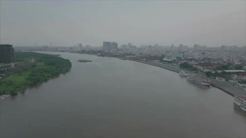 Drone forward tracking over Saigon River Video stock 346604717