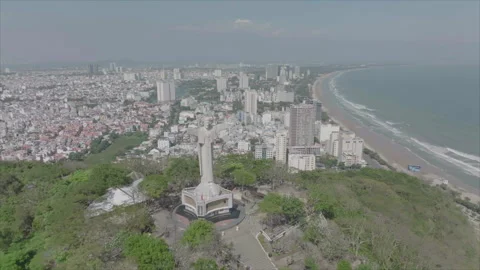 Drone forward tracking toward Christ statue in Vung Tau, Vietnam Stock Footage 346611799