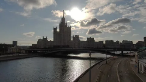 Drone forward view of riverside tower in backlight Stockbeeldmateriaal 322802440