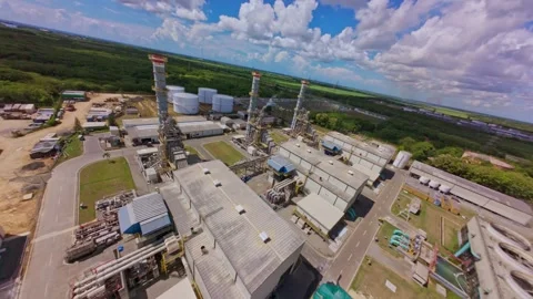 Drone FPV of the Energa 4 power generation facility, fuel storage tanks Stock Footage 319531285