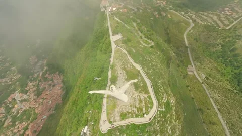 Drone FPV flight on the mountain and reaching Christ the redeemer. Stock Footage 246748668