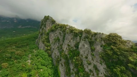 Drone FPV flight over the creast of a mountain. Stock Footage 246748727