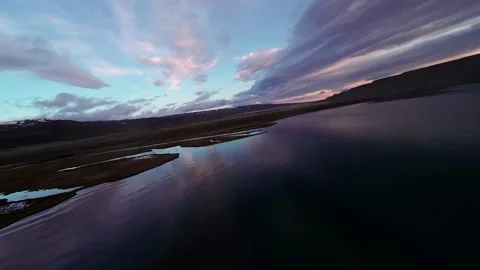 DRONE FPV OVER LAKE IN ARGENTINIAN PATAGONIA, AT SUNRISE Stock Footage 263927731