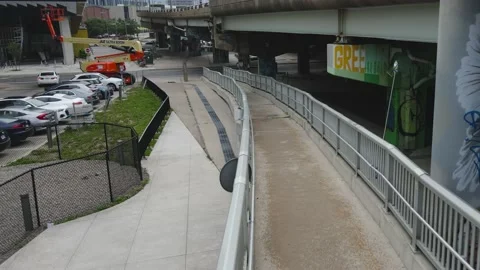 Drone FPV view of Underpass park with people skating in Toronto Stock Footage 170952542