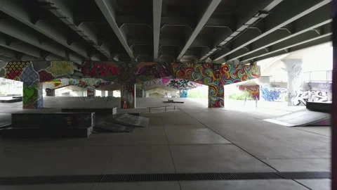 Drone FPV view of Underpass park with people skating in Toronto Stock Footage 170952565