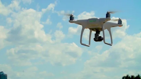 Drone in the frame. Quadcopter on the background of the J . Drone flies Vídeos de archivo 91995590