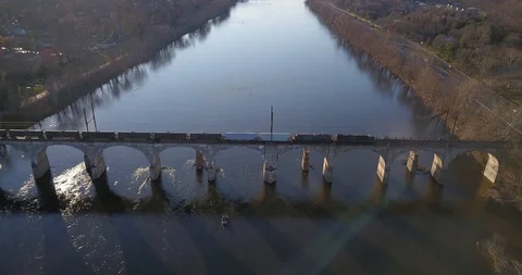 Drone freight train crossing Delaware river Stock-Footage 127053337