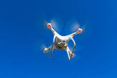Drone in front of blue sky Stock Photos