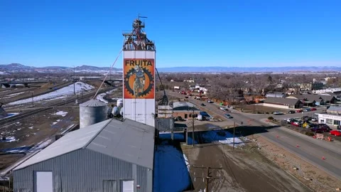 Drone:  Fruita, Colorado Grain Elevator with Mountain Bike Stock Footage 169235993