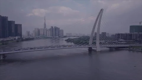 Drone gaining altitude low-angle Ba Son Bridge 스톡 동영상 346605236