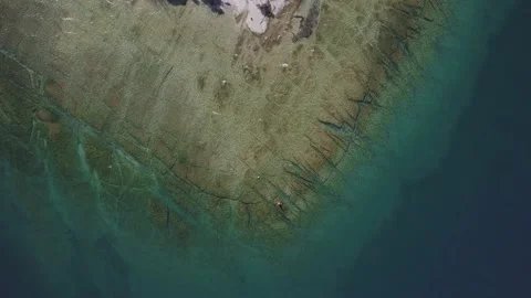 Drone Garda Lake water zenithal rocks Stock Footage