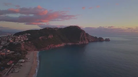 Drone gentle partial orbit around Alanya Castle hill, evening Stock Footage 327459511