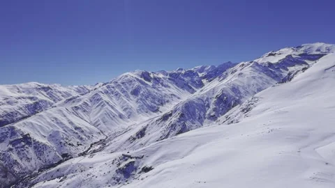 Drone Glide Beside Rounded Snow Ridge Near Farellones Andes 4K Stock Footage 342765611