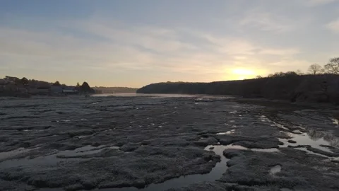 Drone Glides Over An Estuary Covered In Frost On A Clear Winter Morning Stock Footage 301113320