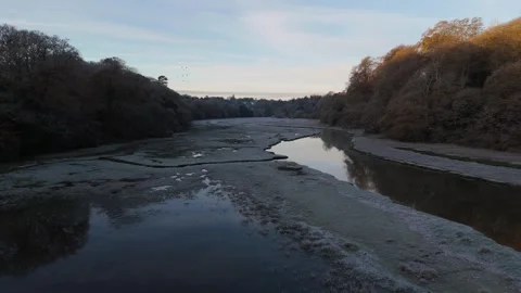A Drone Glides Over An Estuary In Winter At Sunrise Stock Footage 301091678