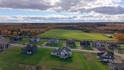 Drone glides over a new subdivision in Alton, Caledon, Ontario with detached Stock Footage 326281794
