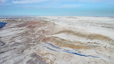 Drone glides over stark, salt-crusted earth Vidéo 347266502