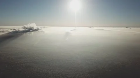 Drone gliding forward at high altitude above the landscape Video stock 333603863