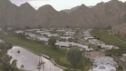 Drone Gliding Over Palm-Lined Golf Pathways 스톡 동영상 307730189