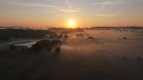 Drone gliding sideways above shimmering waters Stock Footage 341024978