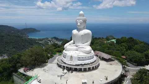 Drone go over the buddha statue's head Stock Footage 194380464