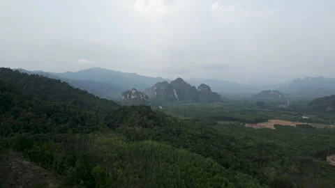 The drone goes deep into green mountains Stock Footage 266496261