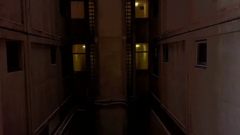 Drone goes inside a residential complex from the foundation to the top Stock Footage 80148904