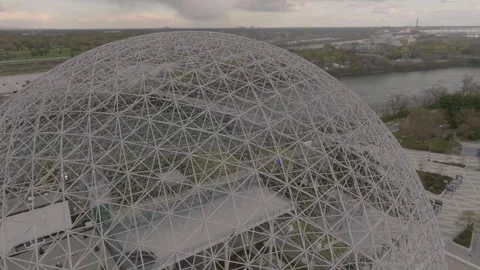 Drone going around the biosfere inside park jean drapeau in quebec canada over Stock Footage 342116203