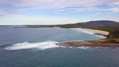 Drone going down the coast near Bawley Point Stock Footage 137528090