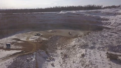 Drone going down to the gold mining quarry Stockbeeldmateriaal 136183508